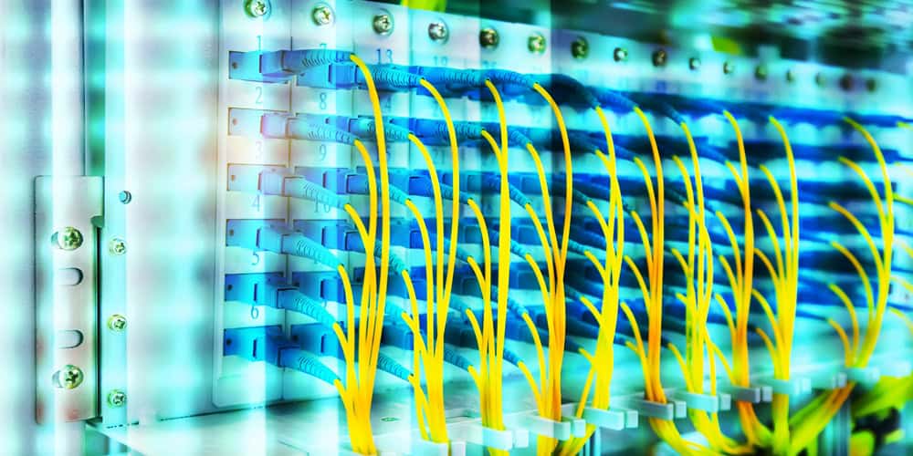 Omnitron fiber-to-PoE switch delivering data and power to operational devices in a modern data center