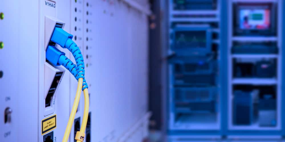 Fiber-connected PoE switch supporting operational technology within a modern data-center facility.